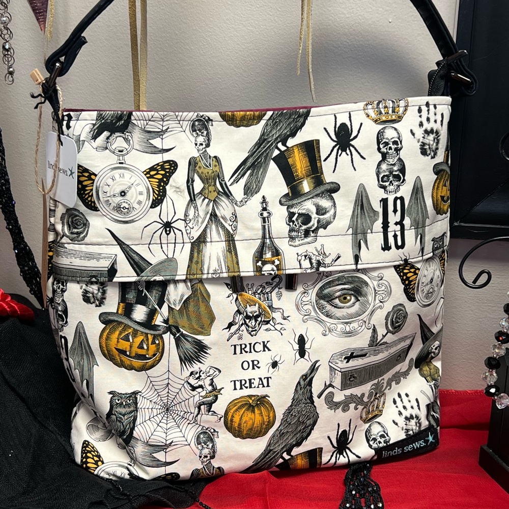 Halloween shoulder Bag w/custom vinyl. Bag approx. 14W x 11.5”H x 4”D.